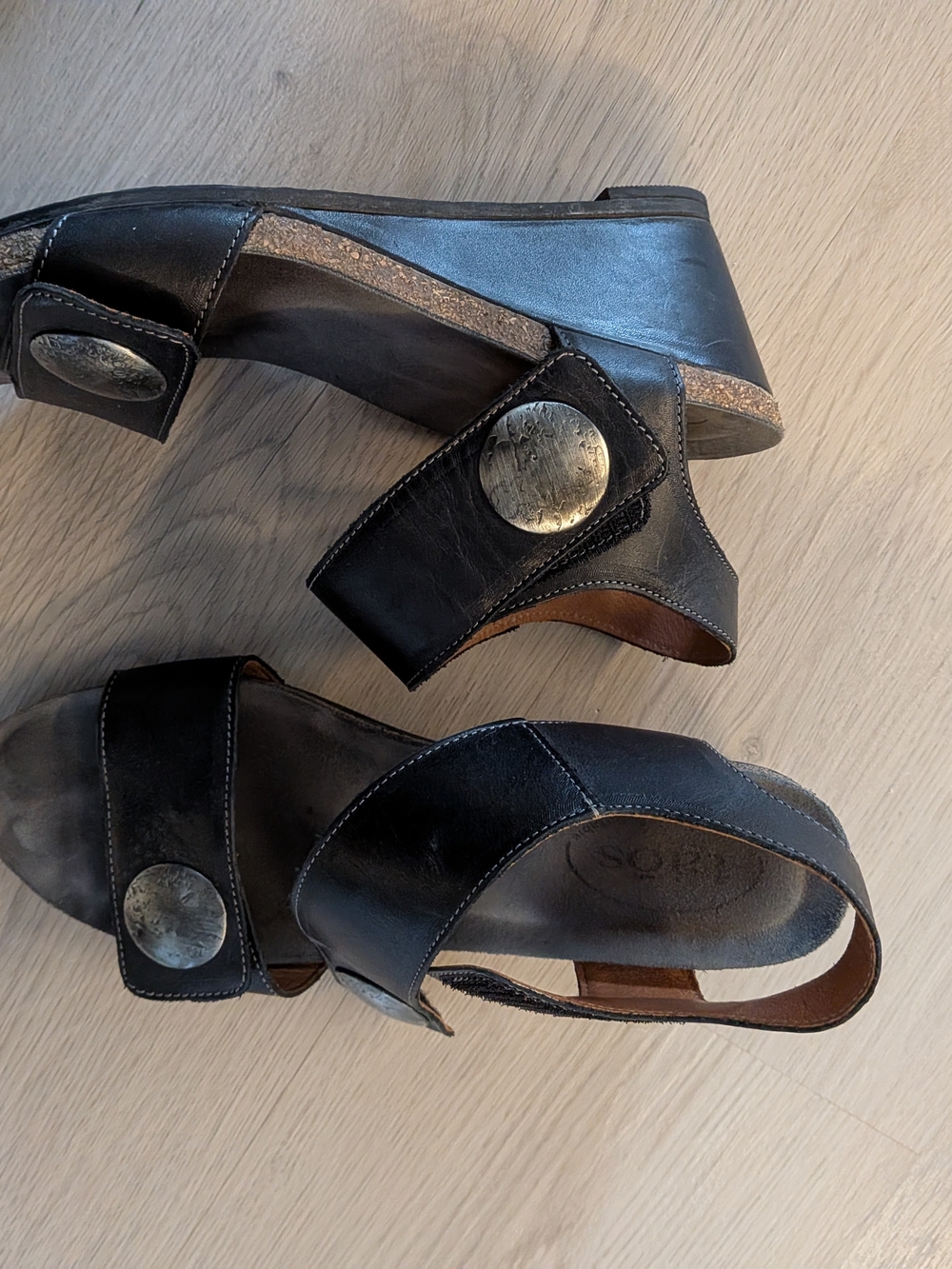 Taos Leather Wedge Sandals with Decorative Metal Accents